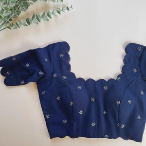 Navy blue scallop blouse with stylish edges. Perfect for sarees, weddings, or festive wear. Custom sizes available. Ready to wear Blouse
