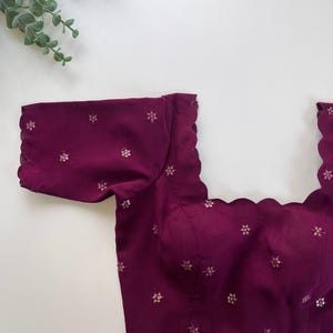 Purple Scallop blouse with stylish edges. Perfect for sarees, weddings, or festive wear. Custom sizes available. Ready to wear Blouse