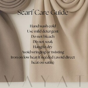 May include: A beige scarf with the text "Scarf Care Guide" and care instructions: hand wash cold, use mild detergent, do not bleach, do not soak, hang to dry, avoid wringing or twisting, iron on low heat.