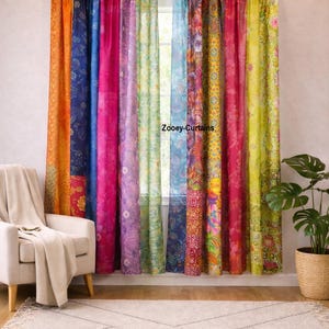 May include: A set of vibrant, patterned curtains in a range of colours including orange, blue, pink, green, and yellow. The curtains are made from different fabrics and designs. The text "Zooey-Curtains" is visible on the curtains.