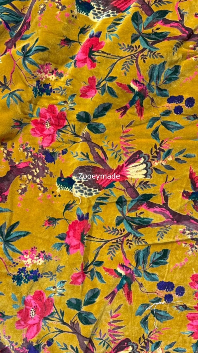 May include: Mustard yellow fabric with a floral and bird pattern. The design features pink flowers, teal leaves, and birds with white, teal, and red feathers. The text "Zooeymade" is visible on the fabric.