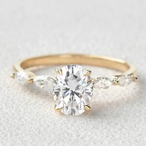Oval Moissanite Engagement Ring: 14K Gold Marquise Side Stones