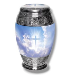 Urna funeraria con cruz de Jesucristo: Urna funeraria negra y dorada para cenizas
