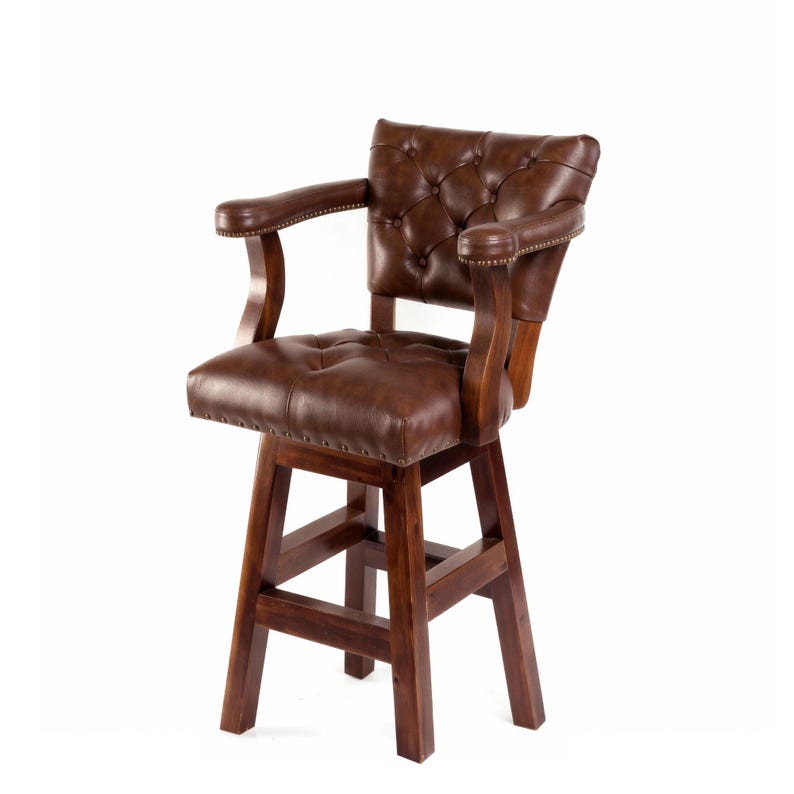 May include: A brown leather bar stool with a button-tufted back and seat. The stool has armrests and a wooden frame. The seat is approximately 18 inches wide. The stool is designed for comfort and style.