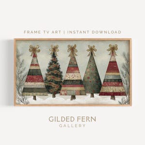 May include: A framed print depicting five decorative Christmas trees in a snowy landscape. The trees are adorned with diverse patterns and gold bows. The text "FRAME TV ART | INSTANT DOWNLOAD" and "GILDED FERN GALLERY" are visible.