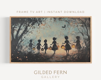 May include: A framed print featuring a Halloween scene. Silhouetted figures of children holding lanterns walk through a forest. The artwork has a muted color palette with the text "FRAME TV ART | INSTANT DOWNLOAD" and "GILDED FERN GALLERY".