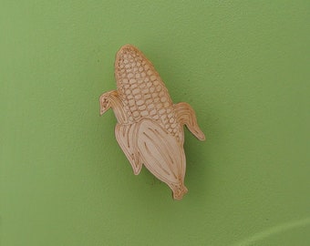 Corn magnet, engraved wood