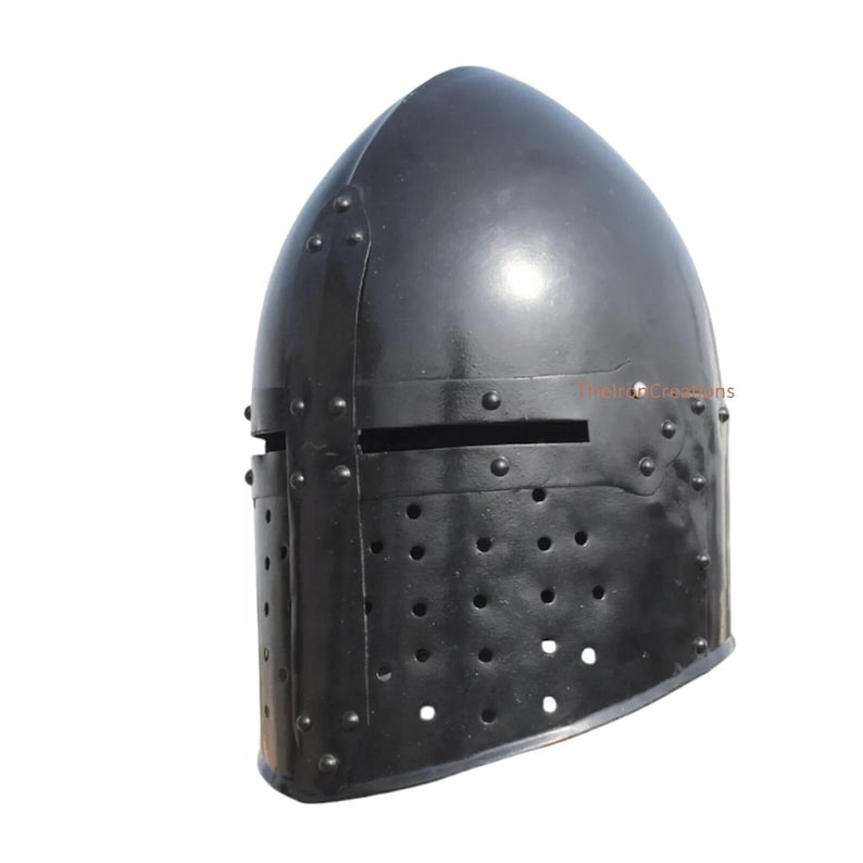 May include: A black, medieval-style helmet with a rounded top and a faceplate featuring eye slits and ventilation holes. The helmet is made of metal and has rivets along the seams. The overall design suggests a historical or fantasy theme.