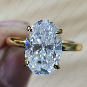 Oval Moissanite Engagement Ring: 14K Yellow Gold Hidden Halo