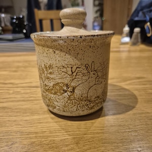 Dunoon Pottery Stoneware Lidded Pot featuring a country scene with rabbits.