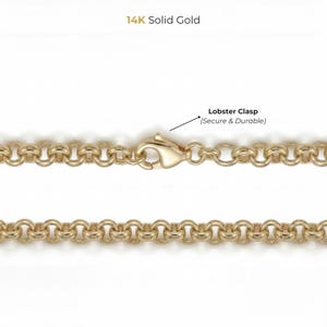 May include: Close-up of a 14K solid gold chain necklace with a lobster clasp. The chain is made of round links and is a bright gold color. The lobster clasp is labeled as "Secure & Durable".