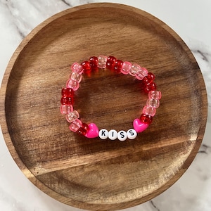 Red “Kiss” Kandi Bead Stretch Bracelet
