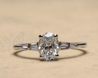 Oval Cut Moissanite Engagement Ring: Baguette Side Stones, Five Stone Ring
