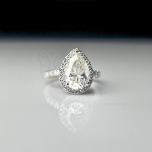 Pear Cut Moissanite Engagement Ring: Halo, Claw Setting, 925 Silver