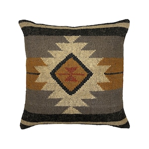 May include: Square woven pillow with a geometric pattern in shades of black, gray, tan, and brown. The central design features a diamond shape with a smaller cross-like design inside.