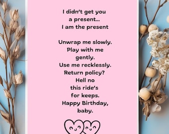 May include: A pink card with the text "I didn't get you a present... I am the present. Unwrap me slowly. Play with me gently. Use me recklessly. Return policy? Hell no this ride's for keeps. Happy Birthday, baby." with two heart illustrations.