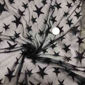 Black stars lace stretch fabric by the yard