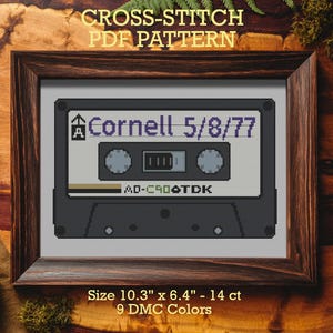 May include: A framed cross-stitch PDF pattern featuring a cassette tape design. The tape displays "Cornell 5/8/77" and "AD-C90 TDK". The framed artwork measures 10.3" x 6.4" and uses 9 DMC colors.