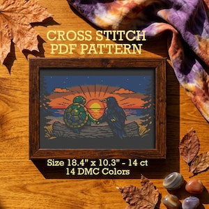 May include: A framed cross stitch PDF pattern featuring a turtle and a crow sitting on a log at sunset. The text reads CROSS STITCH PDF PATTERN and Size 18.4" x 10.3" - 14 ct 14 DMC Colors. The artwork displays a dark blue sky, orange sun, and silhouettes.