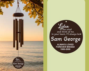 May include: Bronze-colored wind chimes hanging from a tree branch, with a round plaque that reads "Listen to the wind and think of me. In your heart, I'll always be." The plaque also includes the name "Sam George" and dates 1900-2000.