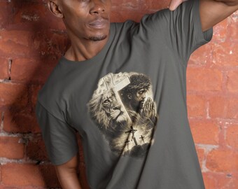 Faith Over Fear Lion and Praying Jesus Glow Cross Shirt – Powerful Christian Graphic Tee for Strength, Prayer & Bold Believers