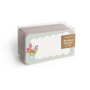 May include: A set of 50 pocket notes in a clear plastic box. The top note features a sage green scalloped border, a colorful floral bouquet in a glass jar illustration on the left, and a brown label with the text Inklings Pocket Notes Set of 50.
