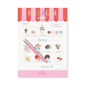 May include: A pink and white ice cream shop order pad with a pink pencil. The pad features a menu with ice cream cone, cup, and sundae options, along with topping choices like sprinkles, gummy bears, cookies, and cherries.