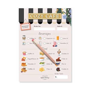 May include: A Cozy Cafe menu notepad with a pencil. The menu includes breakfast and lunch items like coffee, muffins, pancakes, and waffles. The notepad has a black and white striped border and the text "Cozy Cafe".