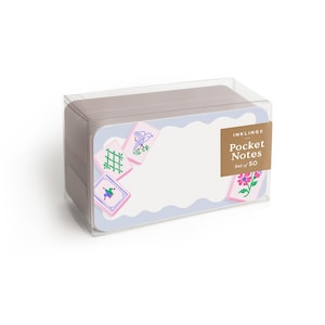 May include: A set of pocket notes in a clear plastic box. The notes have a white background with a light blue scalloped border and decorative square illustrations. The label reads "INKLINGS Pocket Notes Set of 50".