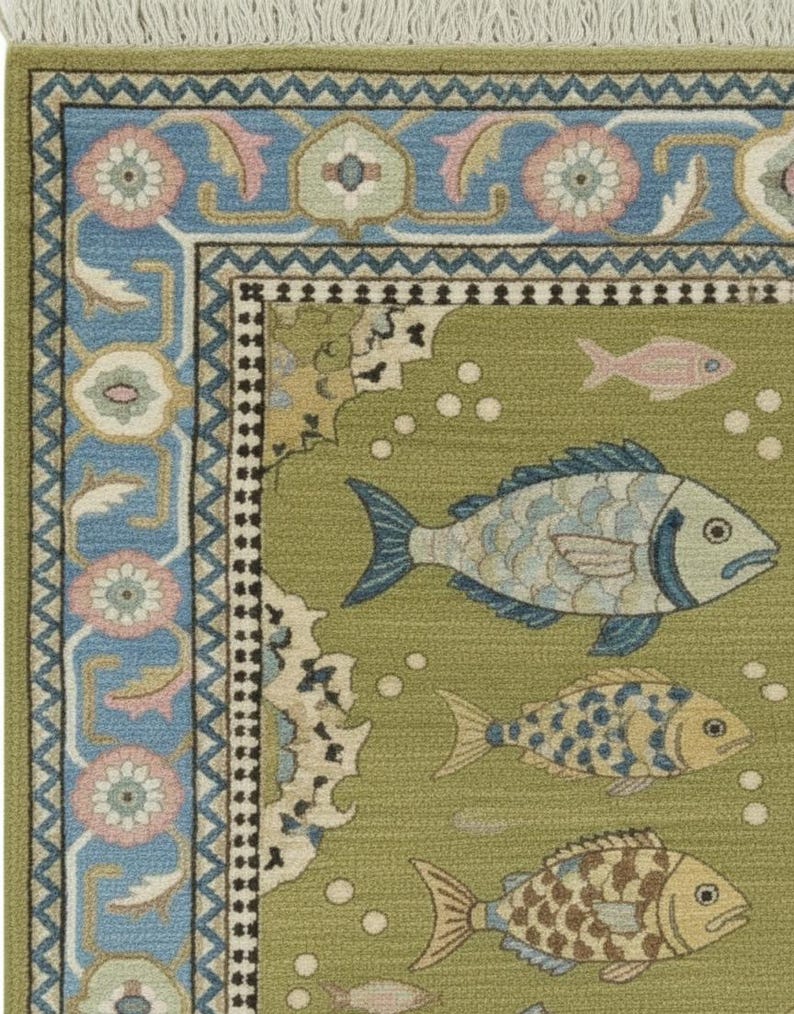 May include: A detailed close-up of a green rug with a fish pattern. The rug features a border with blue and pink floral designs. The main field of the rug has several fish in shades of blue, yellow, and brown, with white bubbles.