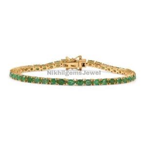 14k Yellow Gold Emerald Tennis Bracelet: Zambian Oval Gemstone