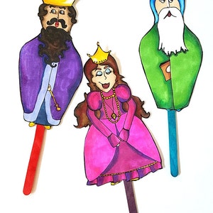May include: Three paper puppets on sticks. A king with a purple robe and gold crown, a queen with a pink dress and gold crown, and a man with a green robe and blue turban.