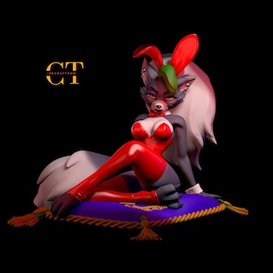 May include: A 3D-printed figurine of a wolf-like character in a red bunny suit, seated on a purple pillow with gold tassels. The character has gray fur, red ears, and a green hair accent. The text "3DCRAFTOON" is in gold.