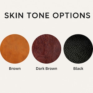 May include: Image showing three circular swatches labelled "Brown", "Dark Brown", and "Black". The text "SKIN TONE OPTIONS" is at the top. The brown swatch is a light tan colour, the dark brown swatch is a deep reddish-brown, and the black swatch is a textured black.