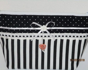 Black and white with heart makeup or culture pouch