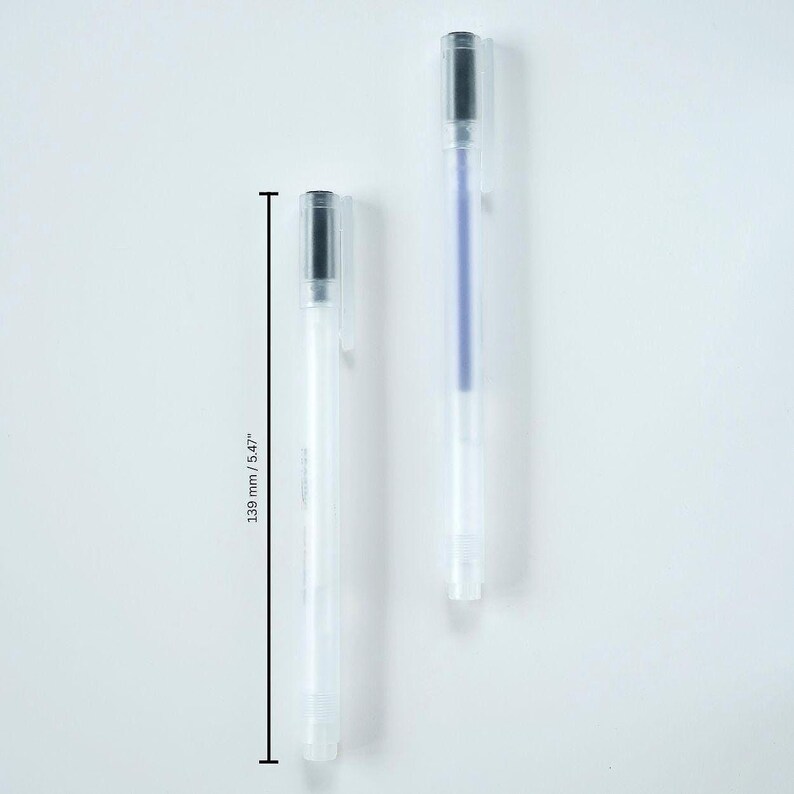May include: Two clear plastic pens with black ink. The pens are 5.47 inches long.