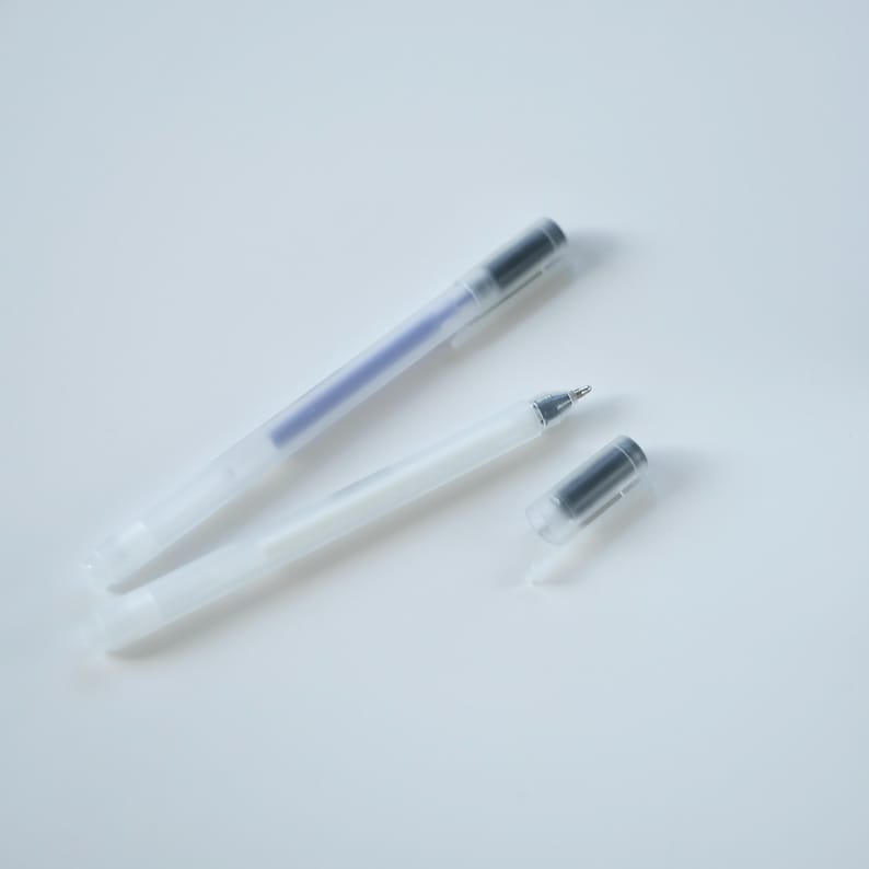blue and white heat erasable pen