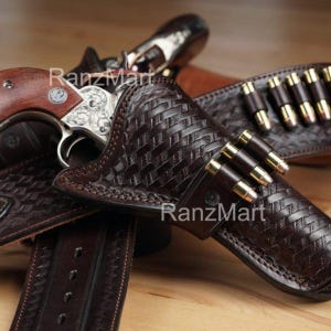 カートリッジベルトタイダウンリボルバー弾薬ループとハンマーストラップウエスタンレザーベルトホルスターガン.22.32.357.38.44.45