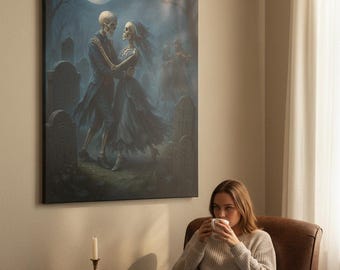 May include: A canvas print depicting a romantic scene of two skeletons dancing in a graveyard under a full moon. The artwork is displayed on a wall above a person sitting in a brown leather armchair.