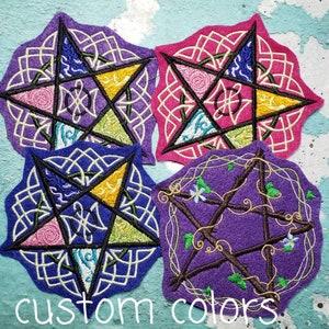May include: Four embroidered pentagram patches in various colors: purple, pink, and blue. Each features a different design within the star, including floral and geometric patterns. The text "custom colors" is at the bottom.