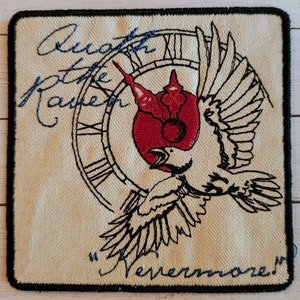May include: A white patch with black stitching around the edges. The patch features a black and white illustration of a raven flying with a clock behind it. The clock face is red with black Roman numerals. The text "Death of the Raven" is written in blue cursive above the clock and "Forevermore" is written in blue cursive below the raven.