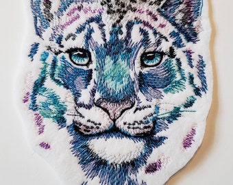 Parche de leopardo de las nieves