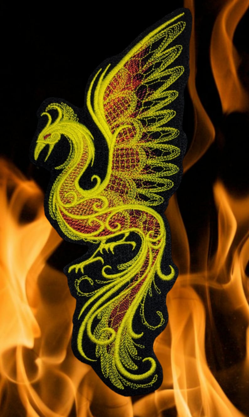 May include: Yellow and red embroidered phoenix patch with intricate details. The phoenix is depicted with its wings spread and a long tail.