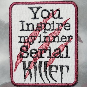 May include: White embroidered patch with red claw marks and the text "You inspire my inner Serial Killer".