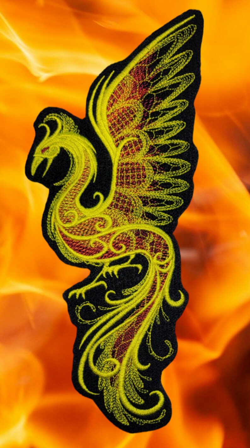 May include: A yellow and red embroidered patch of a phoenix with its wings spread. The phoenix is on a black background.