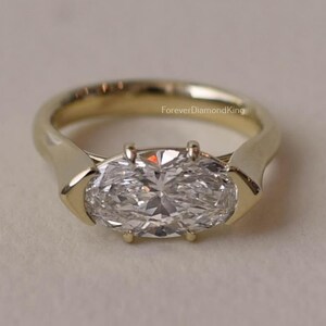 Oval Cut Moissanite Ring East West Moissanite Engagement Ring 2.00 Ct Bezel Set Wedding Ring 14k Yellow Gold Diamond Bridle Ring For Woman