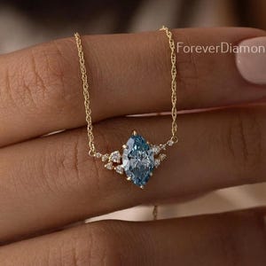 Marquise Cut Blue Moissanite Necklace: 14k Yellow Gold Cluster