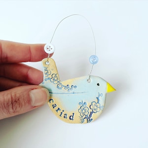 Cariad (Love in Welsh) bird, ceramic hanging decoration. Made in Wales. Free UK delivery