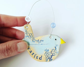 Cariad (Love in Welsh) bird, ceramic hanging decoration. Made in Wales. Free UK delivery