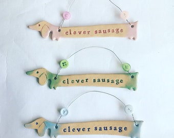 Clever Sausage ceramic dachshund plaque. Made in Wales. Free UK P&P